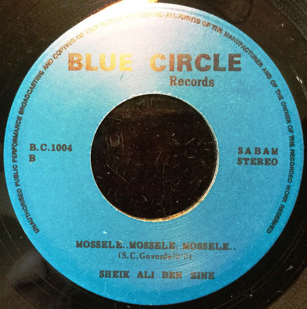Sheik-Ali-Ben-Zine : De Oliesheik Van Wolphaartsdijk / Mossele... Mossele... Mossele (7",45 RPM,Single)