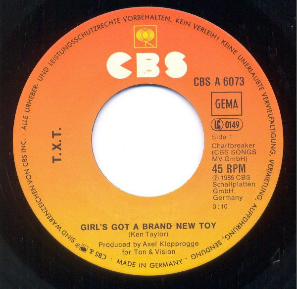 T.X.T. : Girl's Got A Brand New Toy (7",45 RPM,Single)