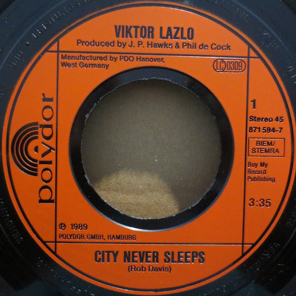 Viktor Lazlo : City Never Sleeps (7",45 RPM,Single,Stereo)