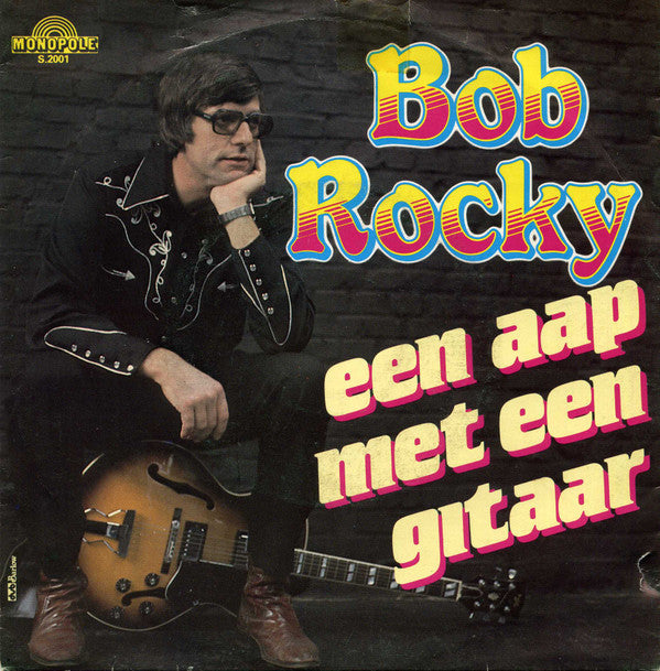 Bob Rocky : Wat Een Weer / Een Aap Met Een Gitaar (7",45 RPM,Single,Stereo)