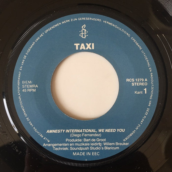Taxi (40) : Amnesty International, We Need You / Russian Fights, American Fights (7",45 RPM,Single,Stereo)