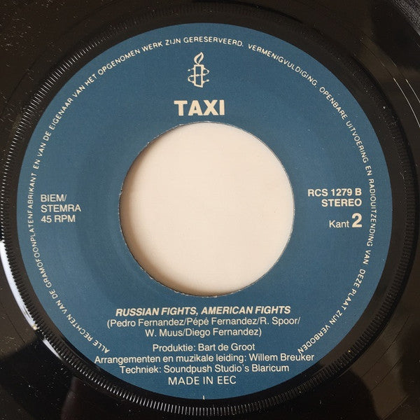 Taxi (40) : Amnesty International, We Need You / Russian Fights, American Fights (7",45 RPM,Single,Stereo)