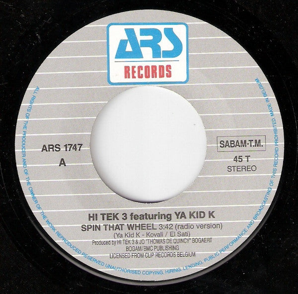 Hi Tek 3 Featuring Ya Kid K : Spin That Wheel (7",45 RPM,Single,Stereo)