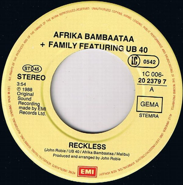 Afrika Bambaataa & Family Featuring UB40 : Reckless (7",45 RPM,Single,Stereo)