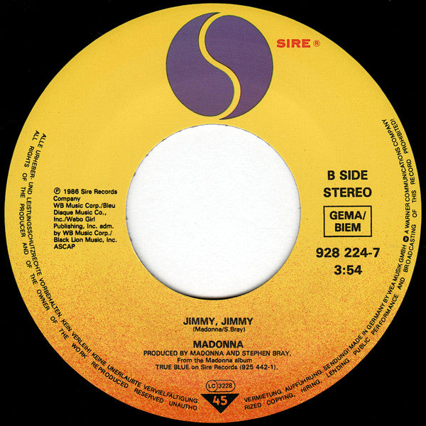 Madonna : Causing A Commotion (7",45 RPM,Single,Stereo)